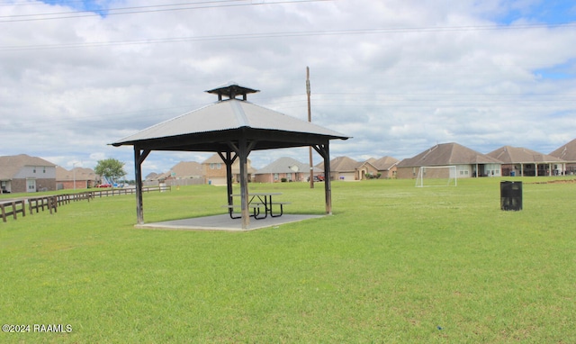 view of community with a gazebo and a yard