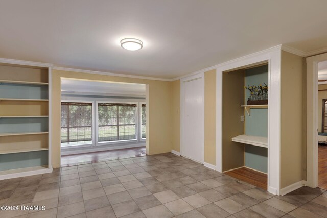 103 Brookside Dr, Lafayette, LA 70506 - tiled empty room featuring ornamental molding