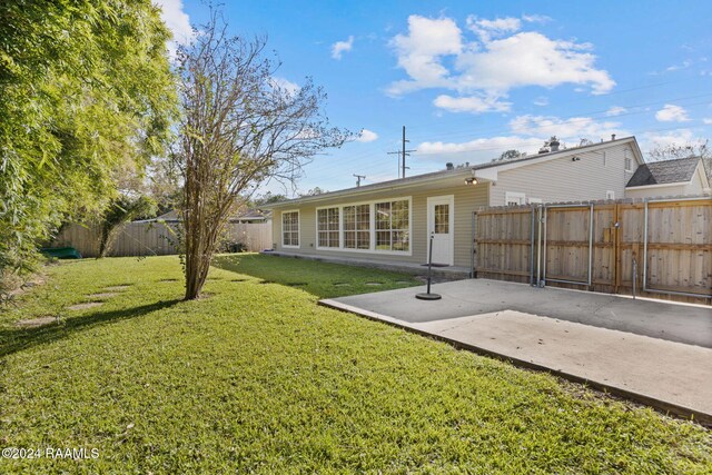103 Brookside Dr, Lafayette, LA 70506 - back of property with a patio area