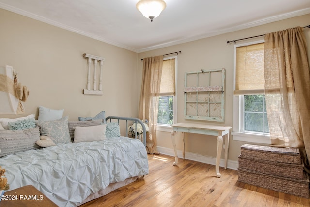 103 Brookside Dr, Lafayette, LA 70506 - bedroom with wood finished floors and ornamental molding