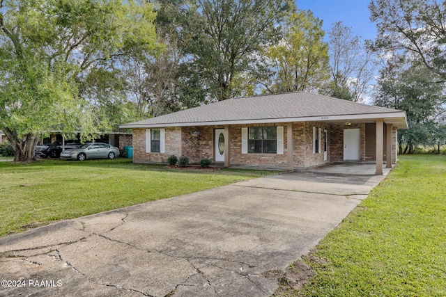 single story home featuring a carport and a front lawn