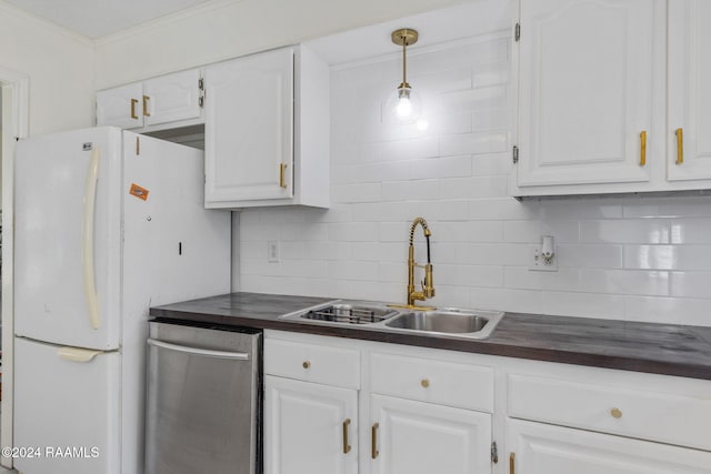 kitchen with backsplash, sink, dishwasher, white fridge, and white cabinetry