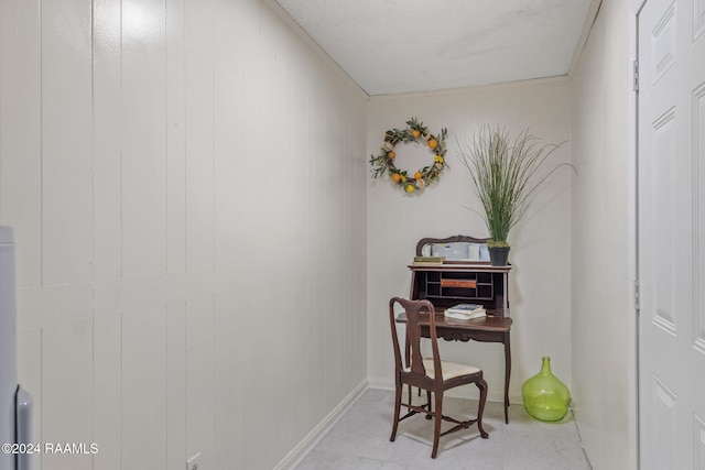 office area with wood walls