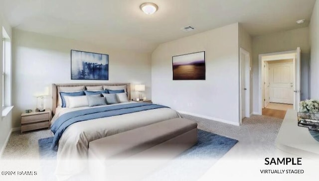 bedroom with light colored carpet