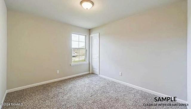 unfurnished room featuring carpet floors