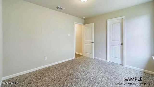 unfurnished bedroom featuring carpet floors