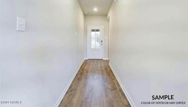 corridor featuring hardwood / wood-style floors