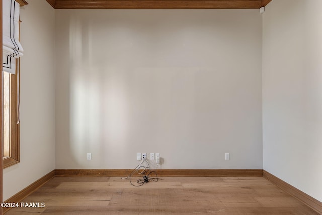 spare room with light hardwood / wood-style floors