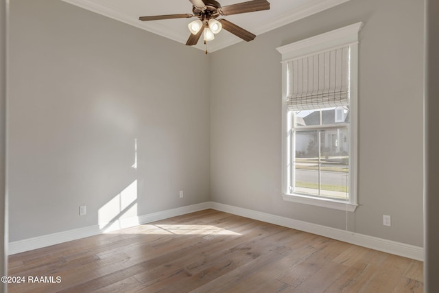 unfurnished room with light hardwood / wood-style flooring, ceiling fan, and ornamental molding