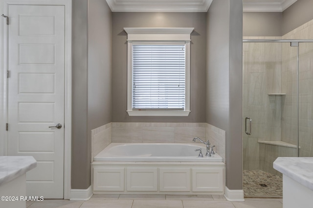 bathroom featuring shower with separate bathtub, vanity, tile patterned floors, and crown molding