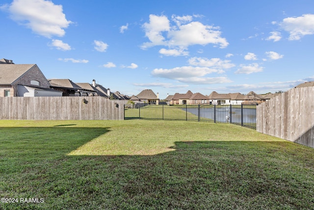 view of yard with a water view