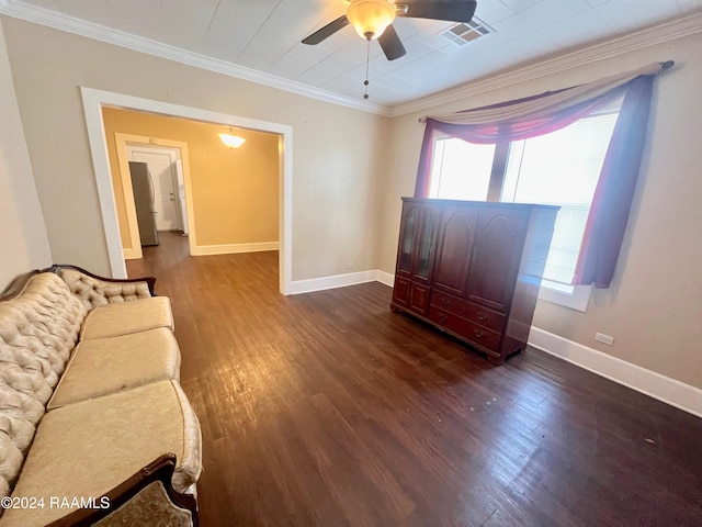 unfurnished living room featuring crown molding, dark hardwood / wood-style flooring, and ceiling fan