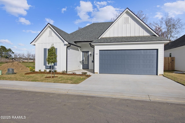 modern farmhouse featuring a garage