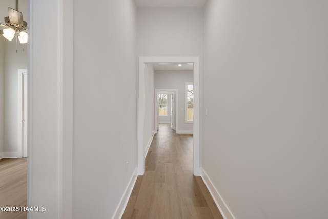 corridor featuring light hardwood / wood-style flooring