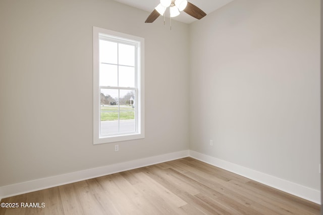 spare room featuring ceiling fan and light wood-type flooring