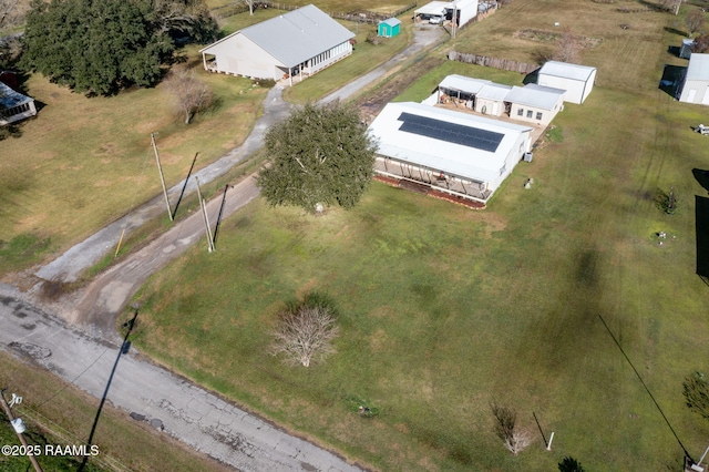 birds eye view of property featuring a rural view