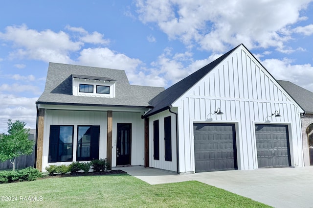 modern farmhouse featuring a front lawn