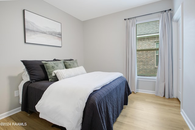 bedroom featuring light hardwood / wood-style floors