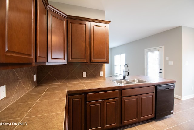 kitchen with dishwasher, sink, tile countertops, decorative backsplash, and light tile patterned floors