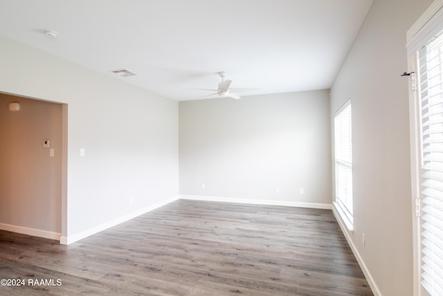 unfurnished room featuring ceiling fan and wood-type flooring