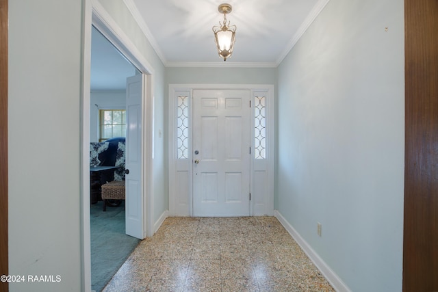 entrance foyer featuring ornamental molding