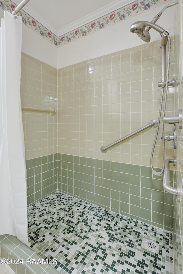 bathroom with a shower with shower curtain, tile patterned flooring, and crown molding