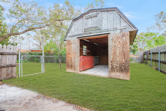 view of outdoor structure featuring a yard