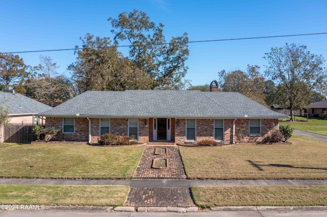 single story home with a front yard