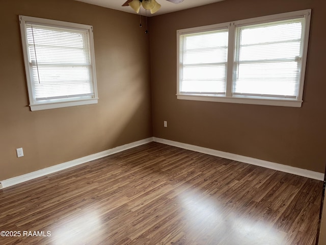 unfurnished room featuring ceiling fan and wood-type flooring