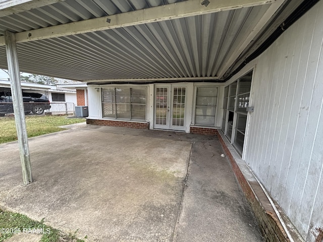 view of patio / terrace with central air condition unit and french doors