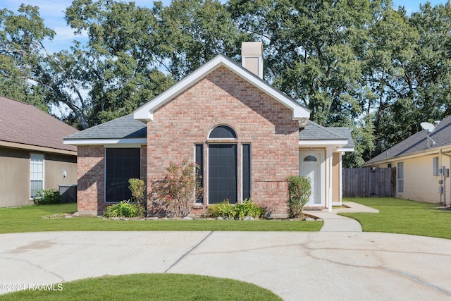 view of front of home with a front yard