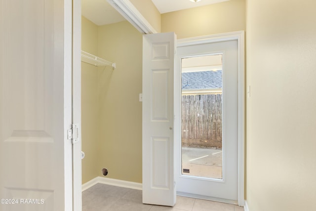 interior space featuring light tile patterned flooring