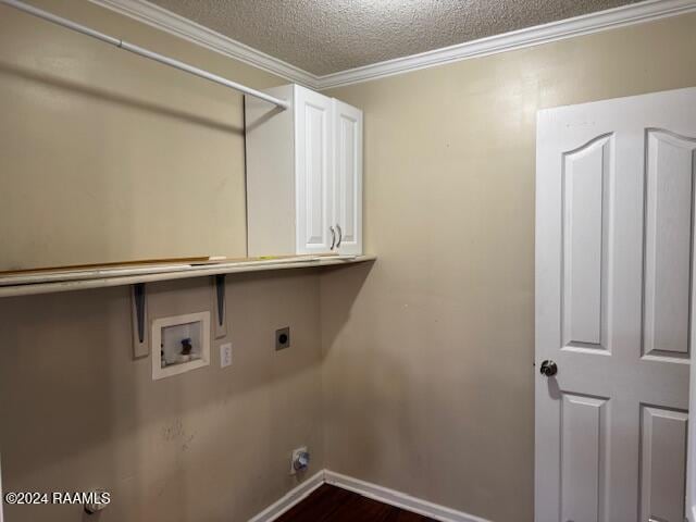 laundry room with washer hookup, cabinets, electric dryer hookup, a textured ceiling, and ornamental molding