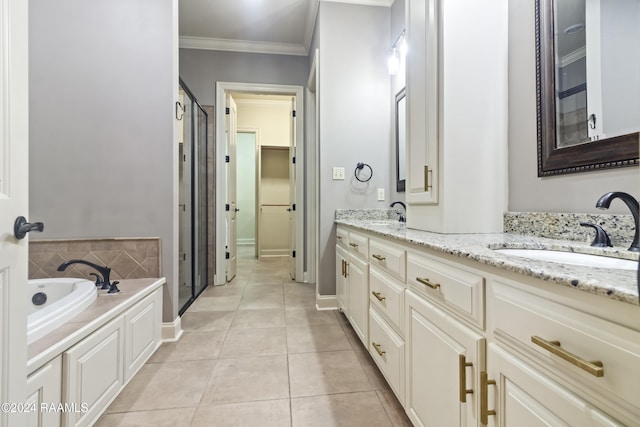 bathroom with tile patterned floors, crown molding, vanity, and separate shower and tub