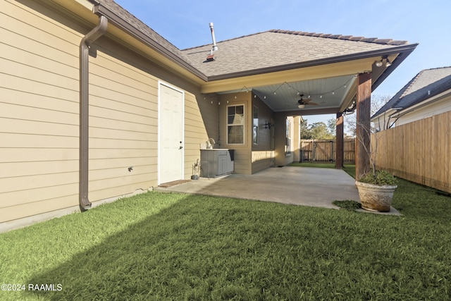 exterior space with a patio area and ceiling fan