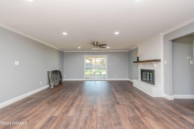 unfurnished living room featuring dark hardwood / wood-style flooring, ceiling fan, and ornamental molding