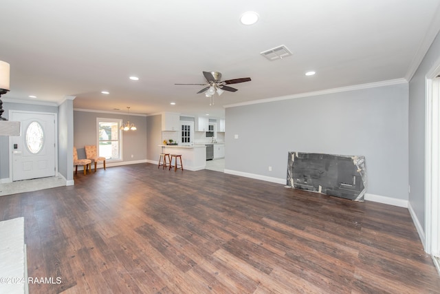 unfurnished living room featuring ceiling fan with notable chandelier, dark hardwood / wood-style floors, and ornamental molding