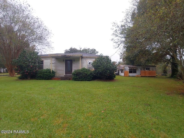 exterior space with a front yard