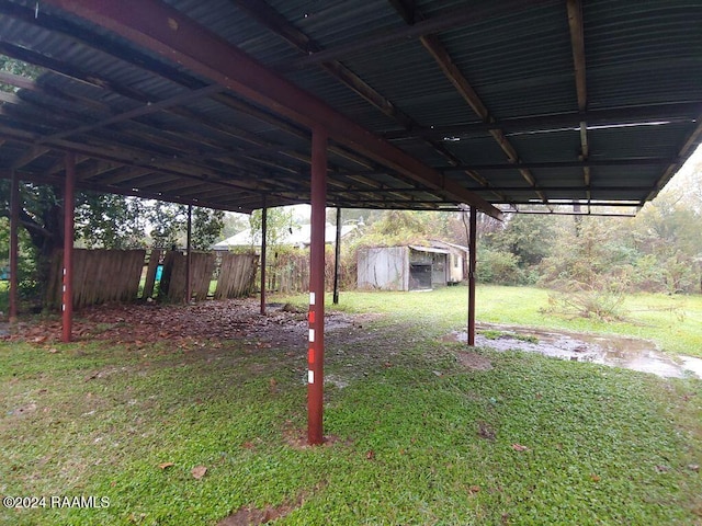 view of yard with an outdoor structure