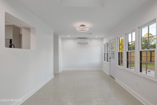 corridor with a wall mounted air conditioner, light tile patterned floors, and crown molding