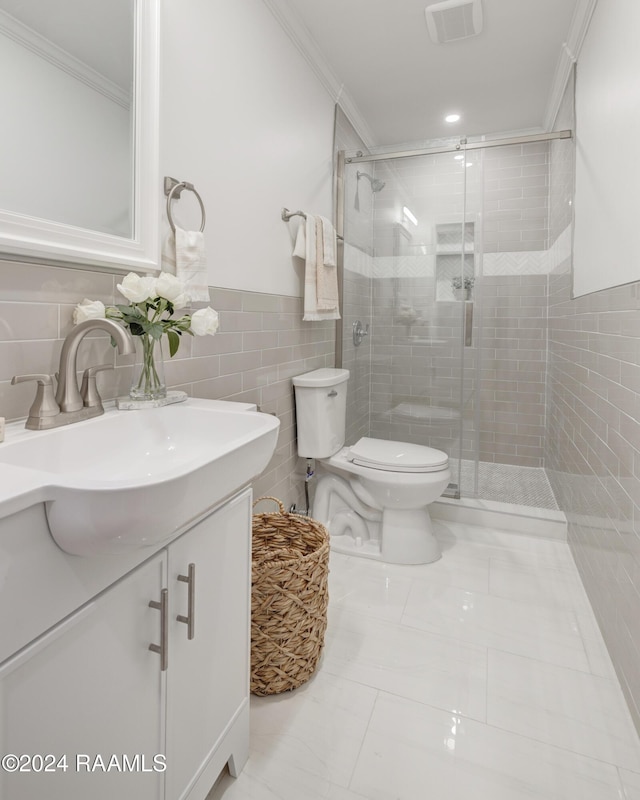 bathroom featuring walk in shower, toilet, vanity, tile walls, and ornamental molding