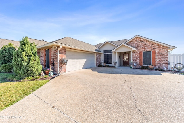 single story home featuring a garage