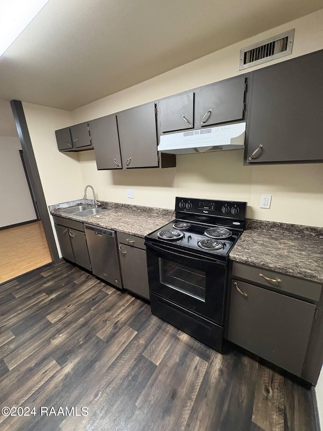 701 S College Rd Unit 307, Lafayette, LA 70503 - kitchen featuring black electric range, under cabinet range hood, dishwasher, dark wood-type flooring, and dark countertops