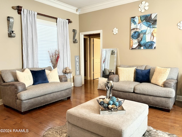 living room with dark hardwood / wood-style floors and crown molding