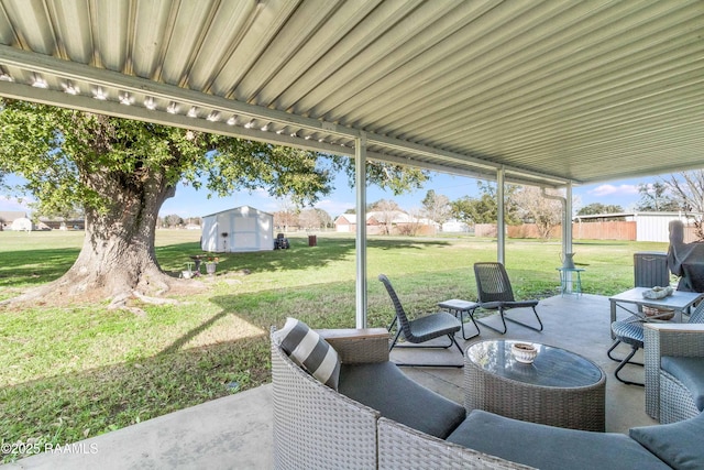 view of patio with a shed