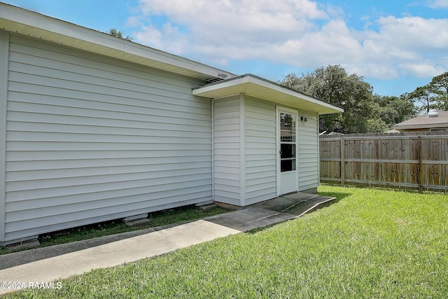 exterior space with a lawn