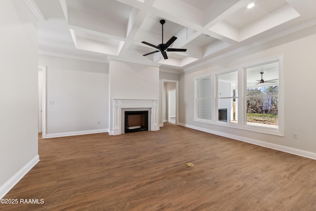 unfurnished living room featuring a fireplace, dark wood finished floors, a ceiling fan, and baseboards