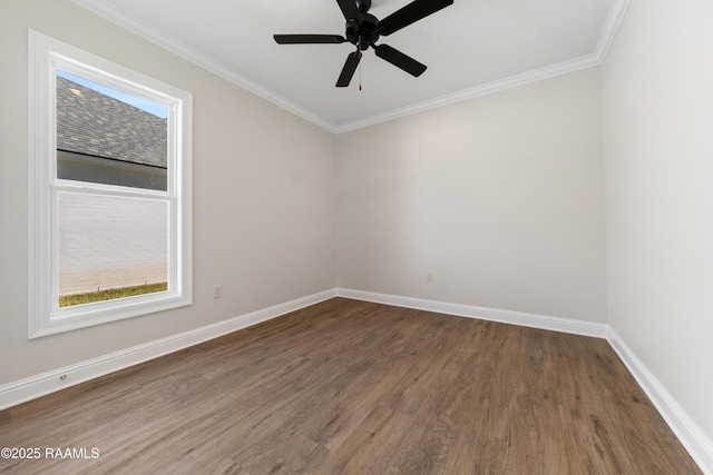 empty room with a ceiling fan, baseboards, wood finished floors, and ornamental molding