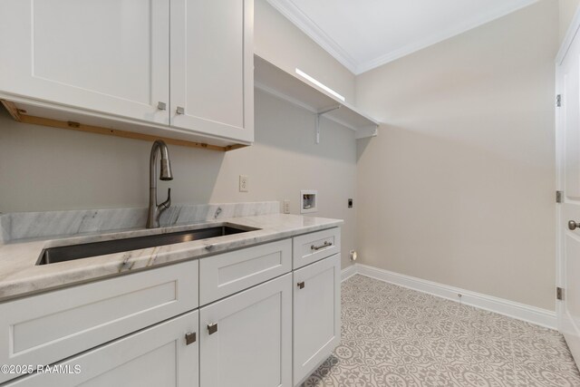 clothes washing area featuring hookup for a washing machine, cabinet space, ornamental molding, hookup for an electric dryer, and a sink