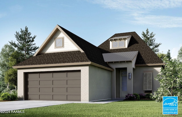 view of front of property with a front yard and a garage